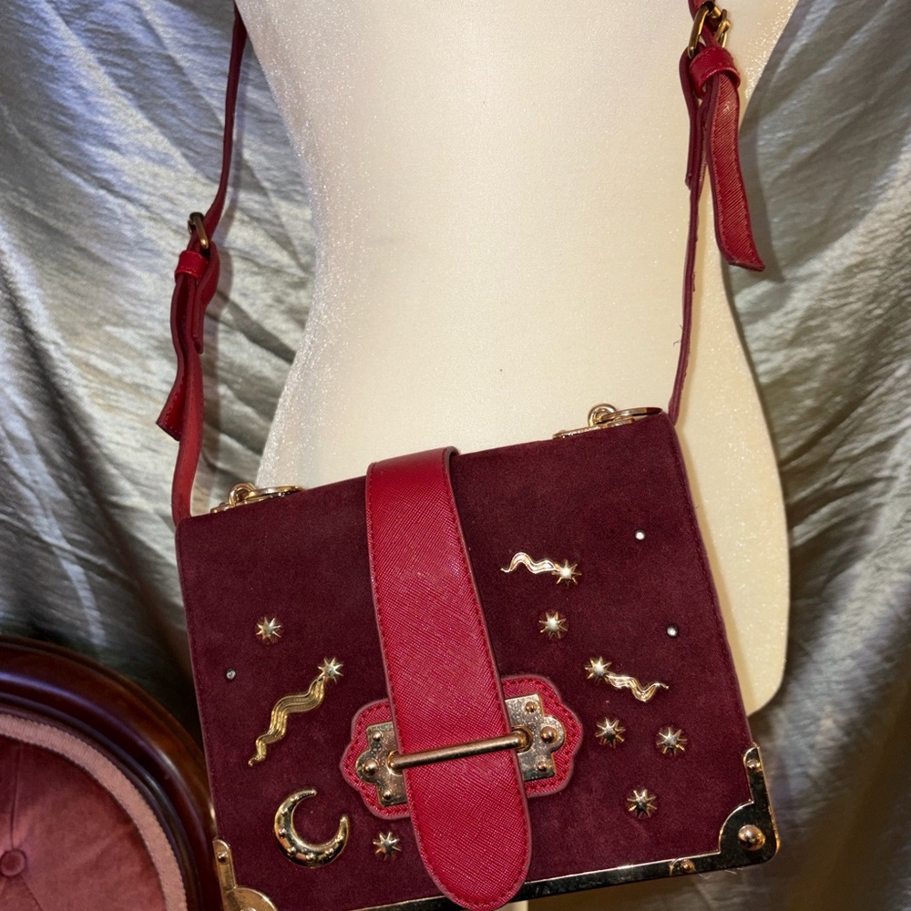 Elegant Burgundy Crossbody Bag with Gold Accents